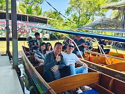 Hire a van to go to the floating market.