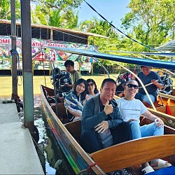 Hire a van to go to the floating market.