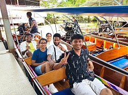 Book a minivan to Damnoen Saduak Floating Market.