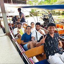 Book a minivan to Damnoen Saduak Floating Market.