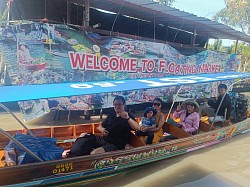 Hire a van for a tour of Damnoen Saduak Floating Market.