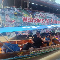 Hire a van for a tour of Damnoen Saduak Floating Market.