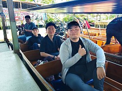 Hire a minivan from Bangkok to Damnoen Saduak Floating Market.