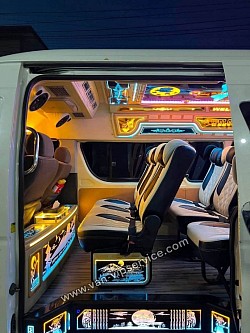 Hire a minivan from Ban Phe.